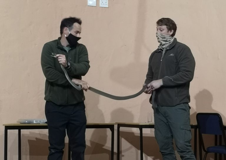 two men and a snake